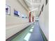 Bright, indoor walking/jogging track with natural light at 251 Tomelloso Way, Davenport, FL 33837