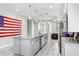 Spacious kitchen with granite countertops, stainless steel appliances, and an island at 251 Tomelloso Way, Davenport, FL 33837