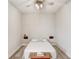 Cozy bedroom with wood-look floors and a ceiling fan at 251 Tomelloso Way, Davenport, FL 33837