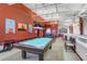 Relaxing billiard room featuring a pool table and comfortable seating at 251 Tomelloso Way, Davenport, FL 33837
