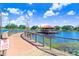 Curving boardwalk with lake views and no boating signage at 251 Tomelloso Way, Davenport, FL 33837