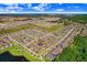Aerial view showing home's location in a residential neighborhood at 251 Tomelloso Way, Davenport, FL 33837
