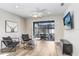 Bright Gathering room with sliding glass doors leading to the backyard at 251 Tomelloso Way, Davenport, FL 33837