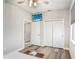 Comfortable bedroom with wood floors and double closets at 251 Tomelloso Way, Davenport, FL 33837