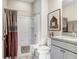 Clean bathroom with granite countertop and a tub shower combo at 251 Tomelloso Way, Davenport, FL 33837