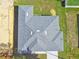 Aerial view of house showcasing roofline and landscaping at 2511 Avenue E Sw, Winter Haven, FL 33880