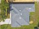 Aerial view of house highlighting roof and yard at 2511 Avenue E Sw, Winter Haven, FL 33880