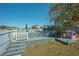 Elevated pool with deck, gate, and play area at 612 Chicago Way, Dundee, FL 33838