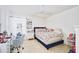 Bedroom with a full-size bed, desk and vanity at 612 Chicago Way, Dundee, FL 33838