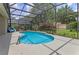 Enjoy this refreshing pool and screened enclosure in the backyard at 4615 Cumbrian Lakes Dr, Kissimmee, FL 34746