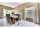 Dining room with a large table and chairs, and natural light from large windows at 4615 Cumbrian Lakes Dr, Kissimmee, FL 34746