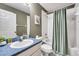 Small bathroom with a tub shower combo at 4615 Cumbrian Lakes Dr, Kissimmee, FL 34746