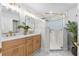 Modern bathroom with double vanity and glass shower at 1716 Palmer Ave, Winter Park, FL 32789