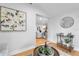 Bright sunroom with hardwood floors, comfortable seating, and a bar cart at 1716 Palmer Ave, Winter Park, FL 32789