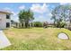 Large backyard with playset and open green space at 2305 Flaming Arrow Dr, Lakeland, FL 33813