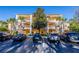 Three-story building with multiple units and parking at 308 New Providence # 308, Davenport, FL 33897