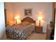 Bright bedroom with a comfortable bed and wicker headboard at 511 Rum Run # 33511, Davenport, FL 33897