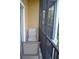 Screened balcony with outdoor seating and nature views at 511 Rum Run # 33511, Davenport, FL 33897