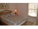 Bedroom with a bed, window, and artwork at 511 Rum Run # 33511, Davenport, FL 33897