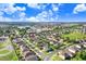 Aerial view of house and neighborhood at 163 Andalusia Loop, Davenport, FL 33837