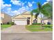 Beautiful one-story house with a well-maintained lawn at 163 Andalusia Loop, Davenport, FL 33837