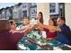Gathering enjoying a casual outdoor get-together at the community space at 6075 Sacred Oak Ave, Mount Dora, FL 32757