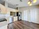 Bright kitchen with stainless steel appliances and wood-look flooring at 7713 Manor Dr, Lakeland, FL 33810