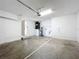 Spacious garage with washer, dryer hookups, and extra storage at 7713 Manor Dr, Lakeland, FL 33810