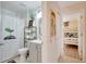 Clean bathroom with gray vanity, toilet and shower at 254 Glasgow Ct, Davenport, FL 33897
