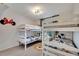 Fun bedroom with a Mickey Mouse theme and bunk beds at 254 Glasgow Ct, Davenport, FL 33897