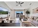 Comfortable living room with sliding doors leading to the pool at 254 Glasgow Ct, Davenport, FL 33897