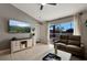 Relaxing living room with a view of the pool at 254 Glasgow Ct, Davenport, FL 33897