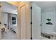 Shared hallway with linen closet, bedroom, and bathroom access at 254 Glasgow Ct, Davenport, FL 33897
