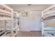 A charming bedroom with twin bunk beds and ample closet space at 254 Glasgow Ct, Davenport, FL 33897