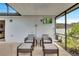 Comfortable patio with seating and backyard view at 254 Glasgow Ct, Davenport, FL 33897
