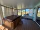 Relaxing hot tub on a wooden deck under a covered patio at 1406 Kissimmee Ct, Kissimmee, FL 34759