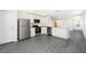 Modern kitchen with stainless steel appliances and an island at 3743 Bergamot St, Lake Alfred, FL 33850