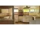 Kitchen with white cabinets and a center island at 242 Oak Hill Rd, Lady Lake, FL 32159