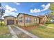 House exterior: Brick ranch with attached garage at 312 E Broadway, Fort Meade, FL 33841