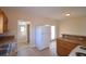 Eat-in kitchen with wood cabinets and access to backyard at 312 E Broadway, Fort Meade, FL 33841
