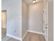 Bright entryway with neutral walls and wood-look flooring at 312 E Broadway, Fort Meade, FL 33841