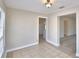 Sunroom with tile floor and access to kitchen and living room at 312 E Broadway, Fort Meade, FL 33841