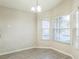 Bright dining area with bay window and vinyl flooring at 2729 Wilshire Rd, Clermont, FL 34714