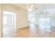 Bright living room with vinyl flooring and ceiling fan at 2729 Wilshire Rd, Clermont, FL 34714