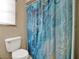 Simple bathroom with shower and toilet at 1057 Old South Dr, Lakeland, FL 33811