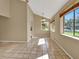 Bright dining room with tile floors and large windows at 1057 Old South Dr, Lakeland, FL 33811
