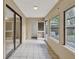 Sunroom with tile floor and exterior access at 1057 Old South Dr, Lakeland, FL 33811