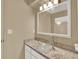 Bathroom with granite countertop, glass vessel sink, and mirror at 1057 Old South Dr, Lakeland, FL 33811