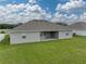 Single story home with backyard and patio at 232 Samantha Ave, Auburndale, FL 33823