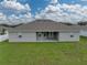 Single story home with backyard and patio at 232 Samantha Ave, Auburndale, FL 33823